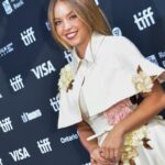 Channel Sydney Sweeney’s Layering Slay in this Mesh Blouse