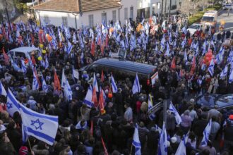 Israelis hold a mass funeral for Shiri Bibas and her sons : NPR