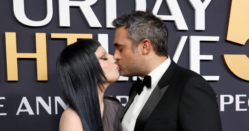 Lady Gaga and Michael Polansky Share Kiss in Rare PDA Moment at SNL 50