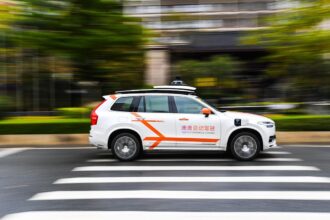 Didi’s Self-Driving Unit Said to Seek Funds at  Billion Value