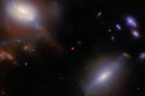 JWST spots the earliest sign yet of a distant galaxy reshaping its cosmic environs