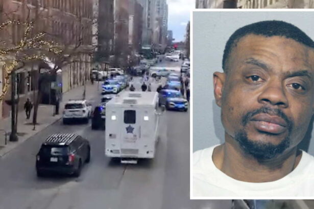 Armed man shot by Chicago police at River North hotel had 2 active warrants, CPD says