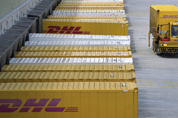 DHL resumes shipping packages over 0 to U.S. customers : NPR
