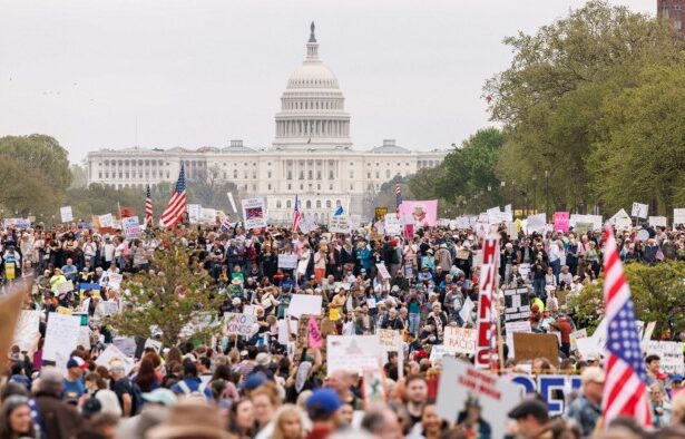 Tens of thousands join protests against Donald Trump and Elon Musk