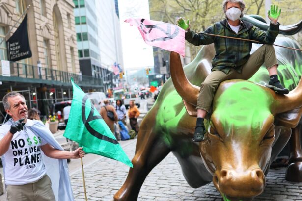 Wall Street’s iconic charging bull statue vandalized by climate activists