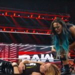 Lyra Valkyria looking down on Becky Lynch [Image Credits: WWE