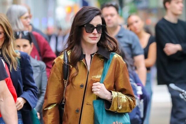 Anne Hathaway Is Giving Major Andy Sachs Energy