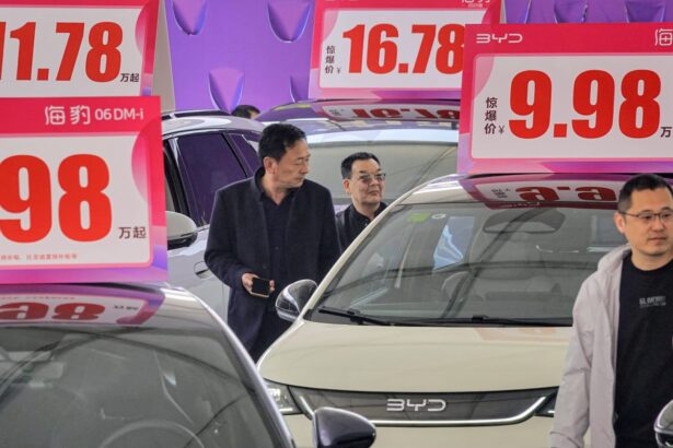 China’s EV price war is heating up. What’s behind the big discounts?