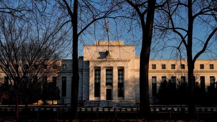 Federal Reserve holds rates steady as it warns of rising economic risks
