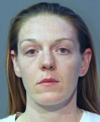 Former cop pleads guilty to killing husband in gun struggle