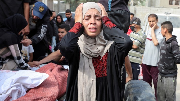 Israeli strikes kill nearly 100 in Gaza on fifth day of offensive