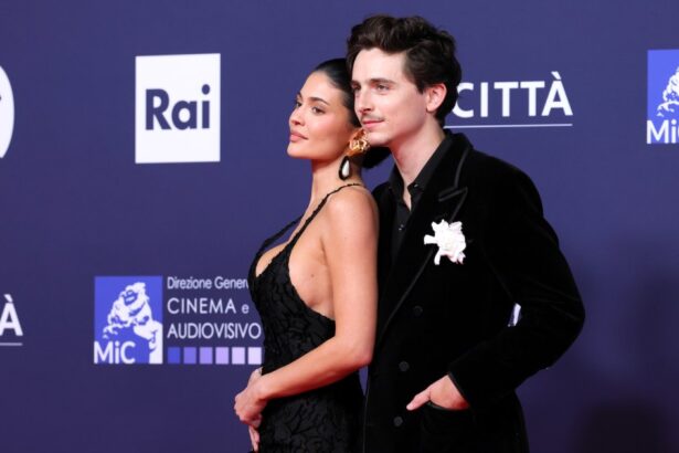 Kylie Jenner Fixes Timothee Chalamet’s Suit Before Red Carpet Debut