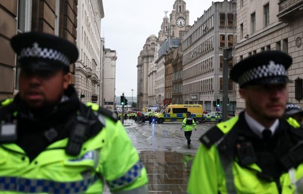 Police arrest man after car hits pedestrians at Liverpool Football Club parade
