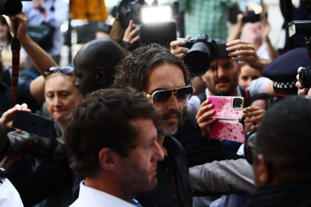 Russell Brand Arrives at London Court for Rape Charge Hearing