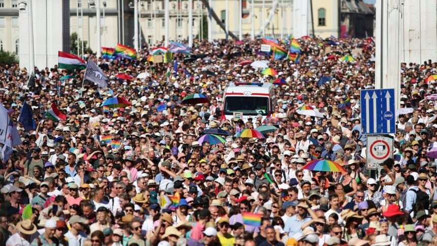 Around 100,000 march in Budapest Pride event in defiance of Hungary’s ban : NPR