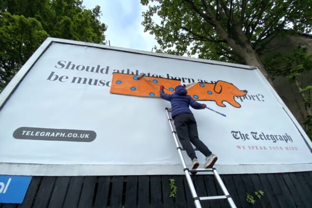 Artist Covers Transphobic Billboard With Giant Dachshund Drawing