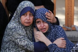 At least 24 Palestinians killed near Gaza aid site