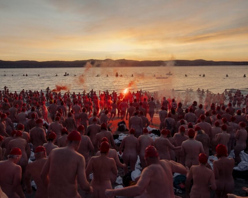 Bare-arsed Aussies brave icy waters for solstice swim