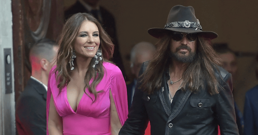 Billy Ray Cyrus’ New Love Elizabeth Hurley ‘Using Him’