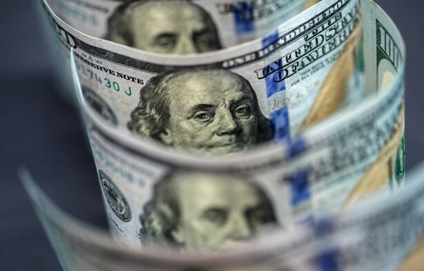Dollar sinks to three-year low on Trump tariff threat