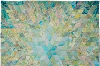 Faith XLVII Sews Textiles Made from World Maps and Currency to Explore the ‘Veins of the World’ — Colossal