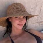 Kendall Jenner Tans in Tiny Black Bikini on Desert Trip