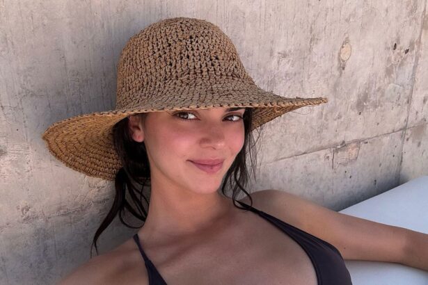 Kendall Jenner Tans in Tiny Black Bikini on Desert Trip