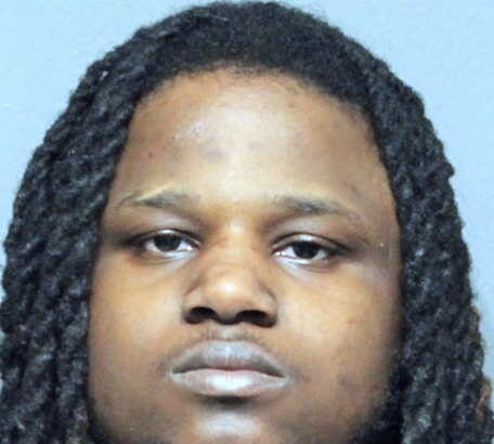 Man charged with having machine gun in car near St. Sabina shooting