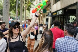 Spaniards turn water pistols on visitors to protest tourism : NPR