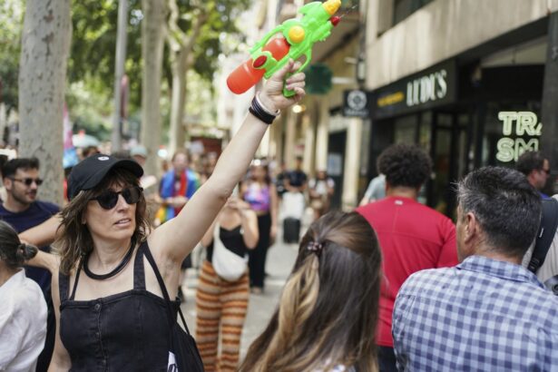 Spaniards turn water pistols on visitors to protest tourism : NPR