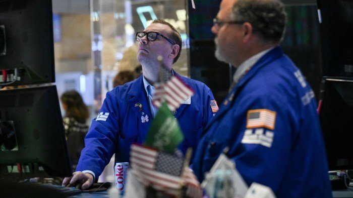Stock trading surge helps Wall Street navigate dealmaking trough
