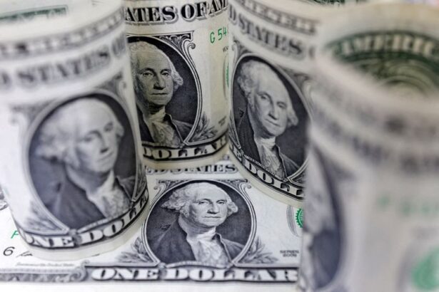 Stocks tick up but dollar hits 2025 low amid mixed macro signals