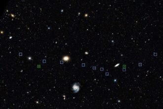 Weird line of galaxies may have been created by a cosmic bullet