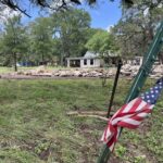 A Texas town takes halting, painful steps toward flood recovery