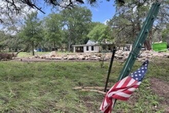 A Texas town takes halting, painful steps toward flood recovery