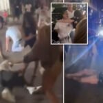 Disturbing video shows woman knocked out cold by jeering crowd in wild Cincinnati street brawl