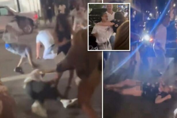 Disturbing video shows woman knocked out cold by jeering crowd in wild Cincinnati street brawl