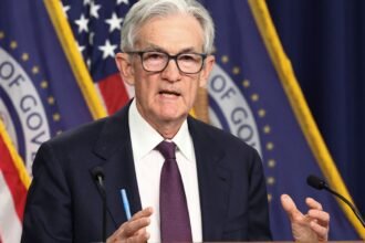 Fed leaves rates unchanged, defying Trump’s demands for aggressive cuts