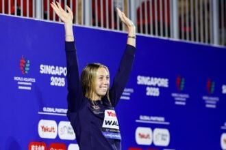 Gretchen Walsh Overcomes Illness To Win First Individual World Title