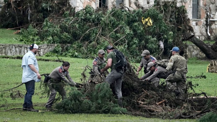 Texas floods toll climbs to over 80 as search for missing girls continues