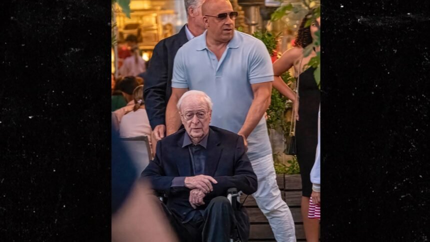 Vin Diesel Pushes Michael Caine in Wheelchair at Dinner in London