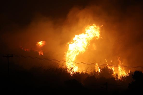 Wildfire rages on popular Greek island