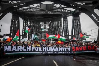 Thousands pour onto iconic Sydney bridge for Gaza