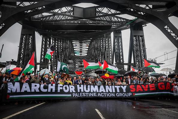 Thousands pour onto iconic Sydney bridge for Gaza