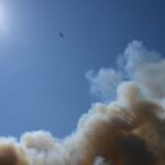 Wildfire smoke, air pollution, vaccine funding