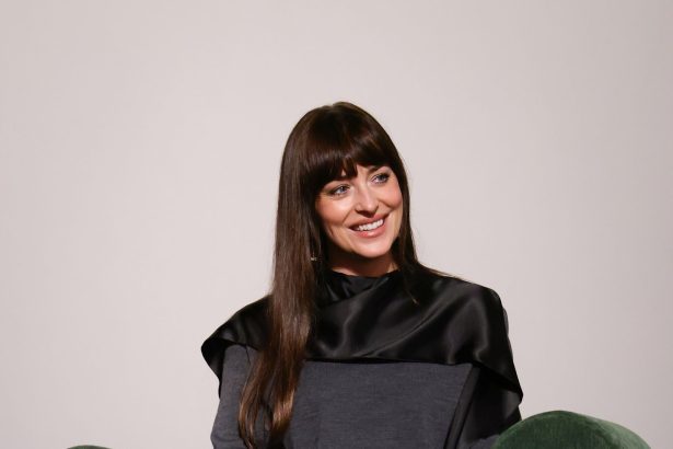 Dakota Johnson Capes up in Fall’s Chicest Outerwear Trend