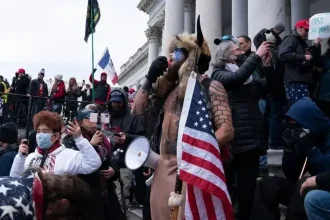 'QAnon Shaman' Files Insane  Trillion Lawsuit Against Donald Trump and the Federal Reserve, Declares Himself Leader of a 'New Constitutional Republic'