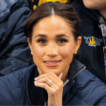 Desperate To Remain Royal? Meghan Markle Shows Off Lavish Floral Display Arranged with Queen Anne's Lace in Million Mansion… as Prince Harry Fights to Rejoin Family