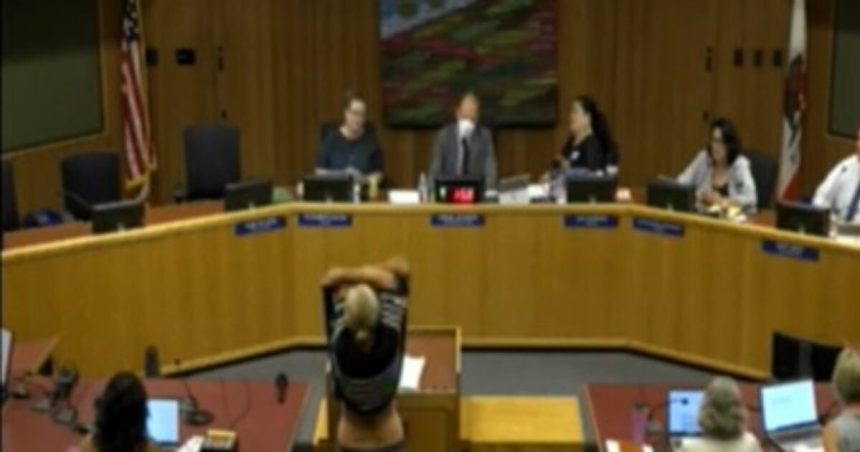WATCH: Chaos Erupts at California School Board Meeting as Conservative Mom STRIPS to Protest District’s Woke Transgender Bathroom Policy | The Gateway Pundit | by Cullen Linebarger