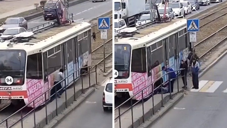 Man Trips, Falls Underneath Moving Train, Somehow Survives, on Video
